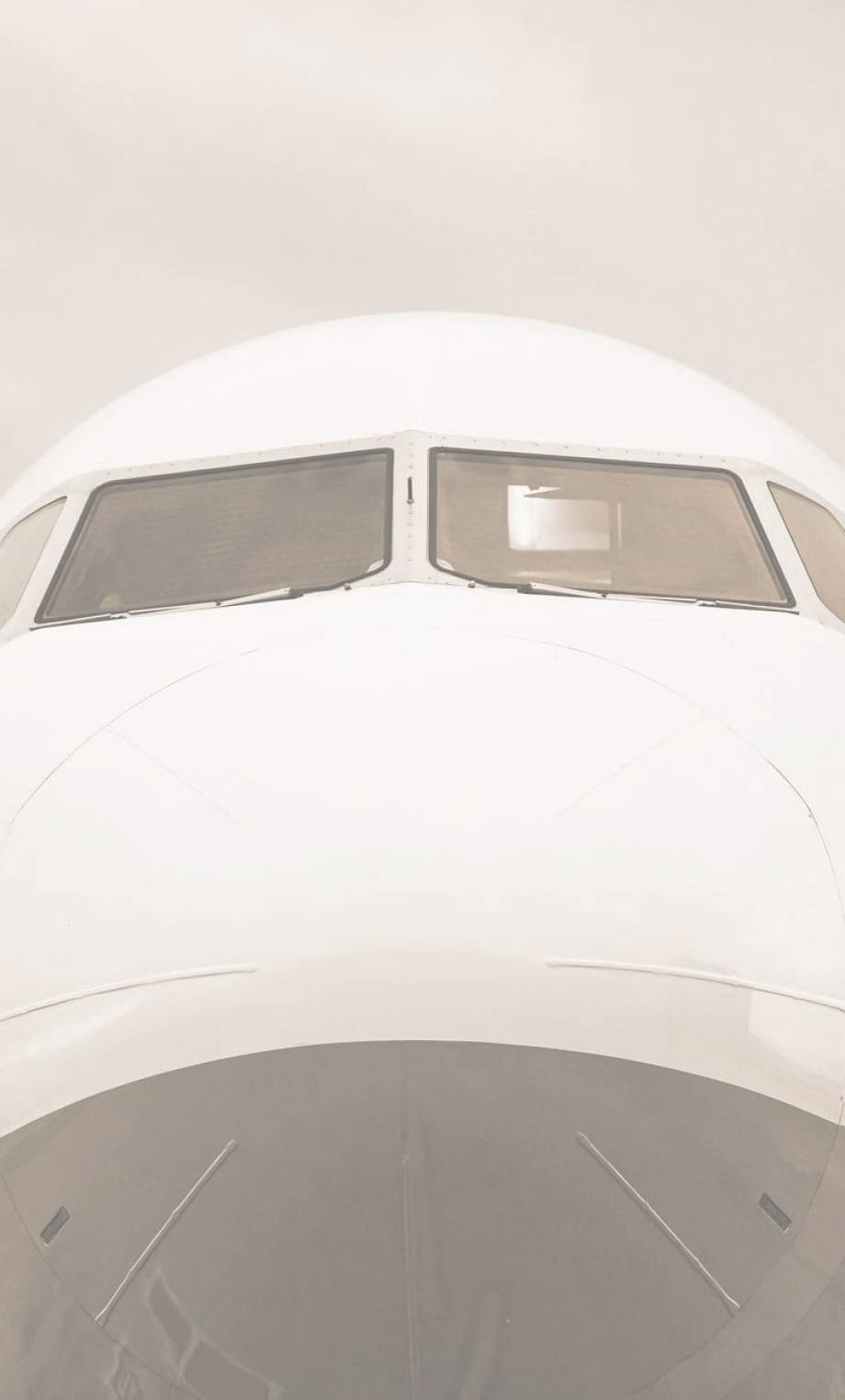front-view-of-the-airplane-nose-against-cloud-sky-2023-11-27-05-22-14-utc (1)-min-min