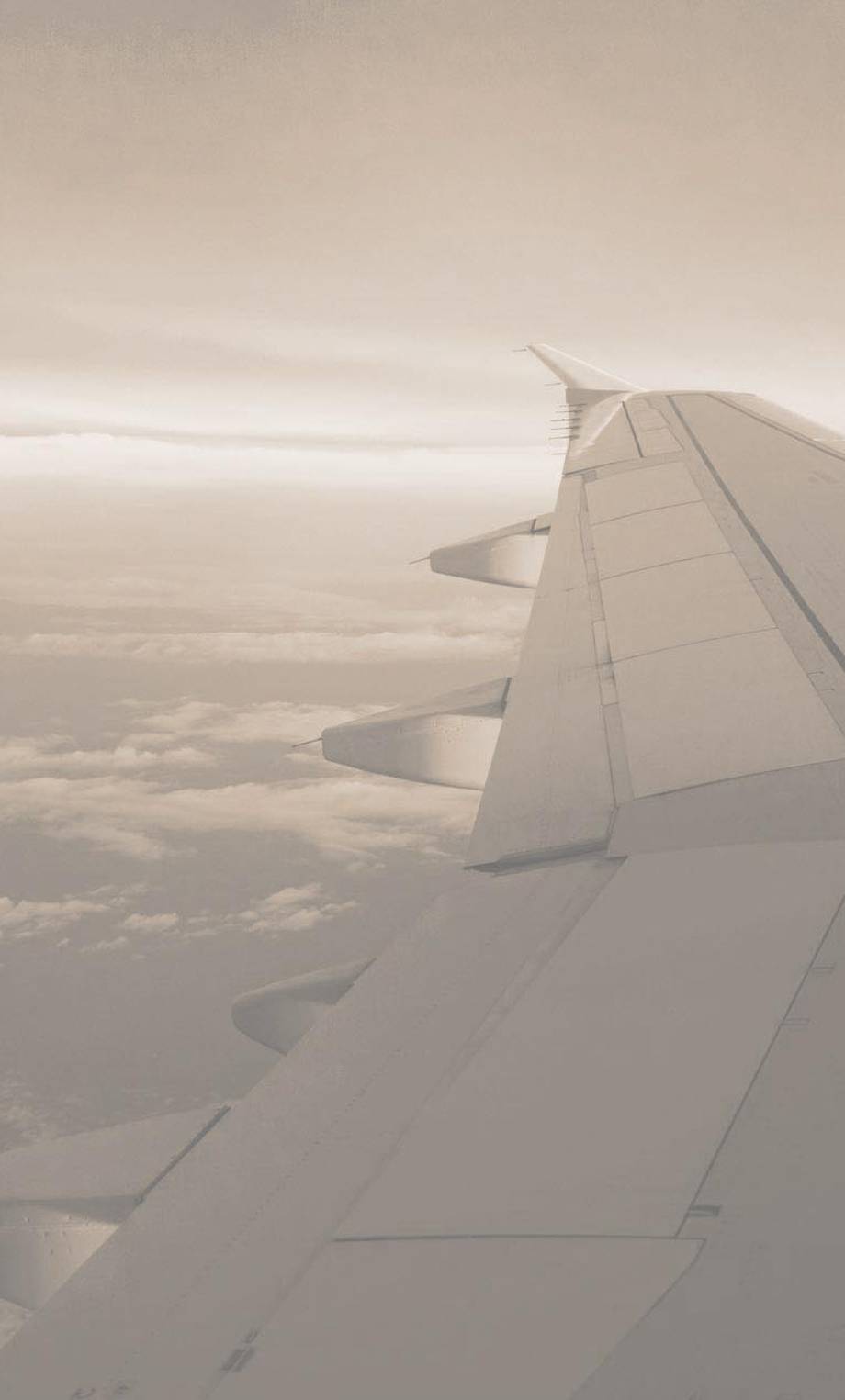 view-from-an-airplane-of-a-sunrise-from-the-sky-2023-11-27-05-32-10-utc (1)-min